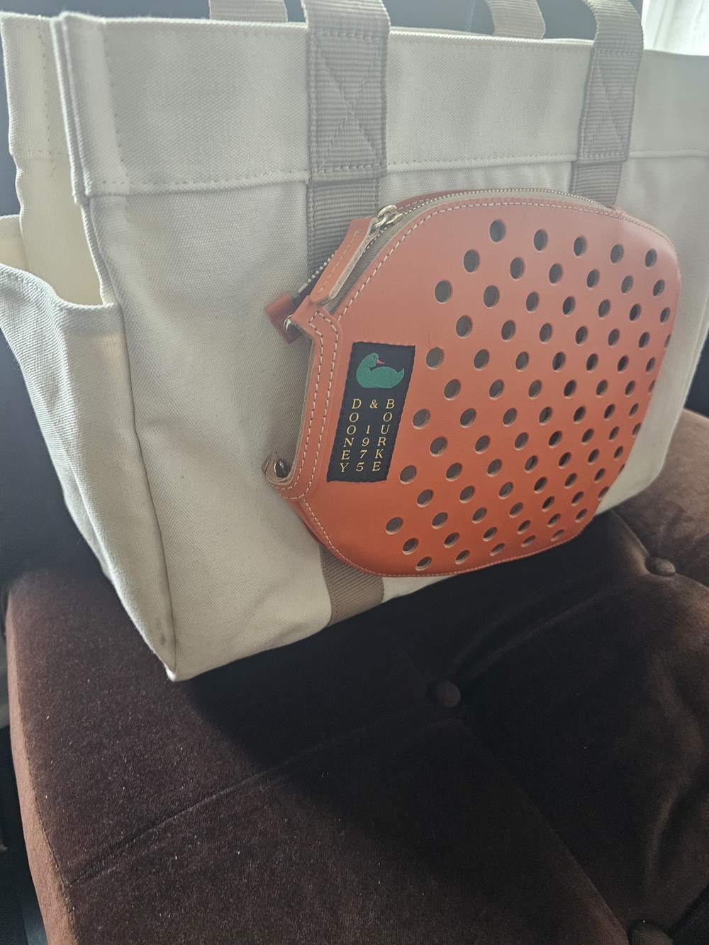 Dooney & Bourke Orange Perforated Leather Pouch Pickleball Tote